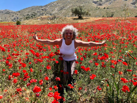 Sonja in a sunny poppy field