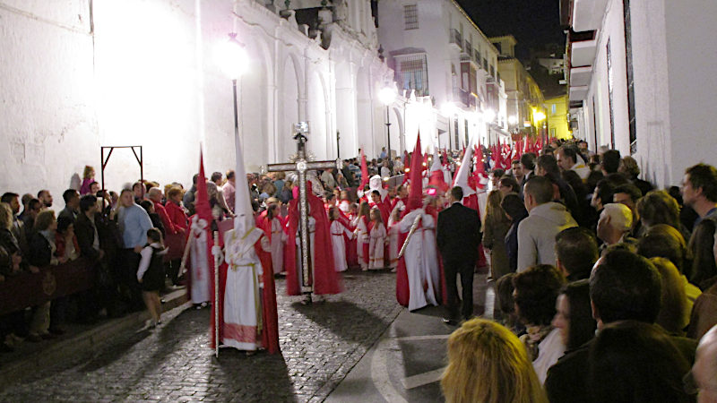 The Antigua Archicofradía de la Santa Vera+Cruz, one of the most prominent brotherhoods in Vélez-Málaga, in their procession robes. Copyright Lutz Dausend