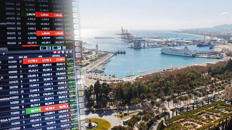 Stock market charts on the left and the port of Malaga on the right