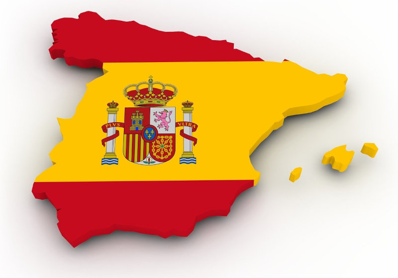 A map of Spain in 3D, covered in the colours of the Spanish flag