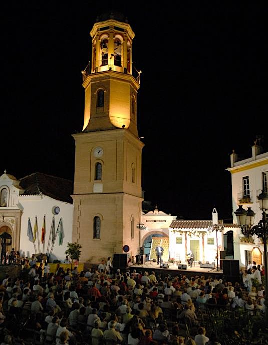 Wine festival with tribune beside the church in Competa at the Costa del Sol