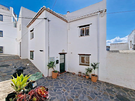 Street view of townhouse front elevation Casa Naranja in Sedella in the Axarquia at the Costa del Sol