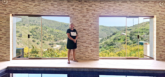 Mel in her pool with a view of the Axarquía