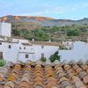 Die Terrassensicht auf den Berg Maroma und die Dächer von Sedella