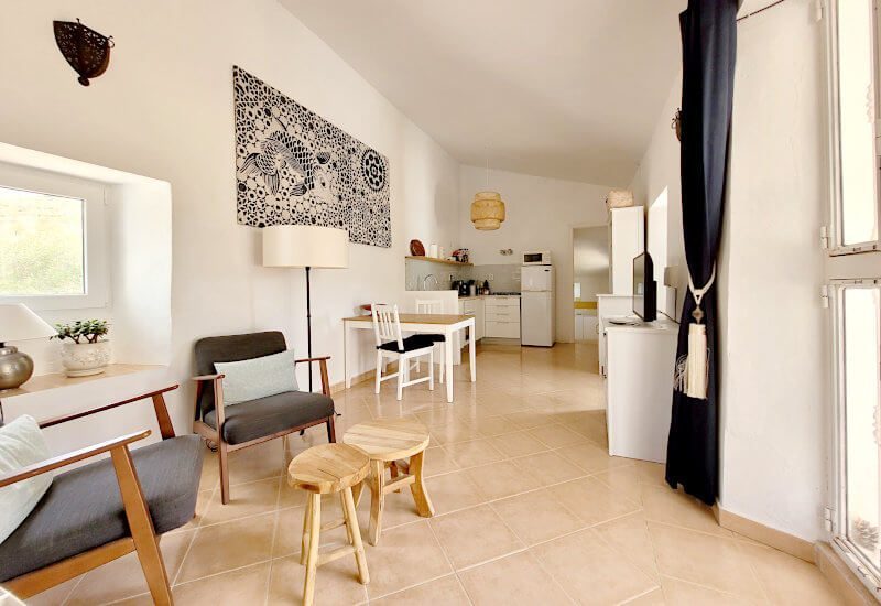 Salon and kitchen of the country house.