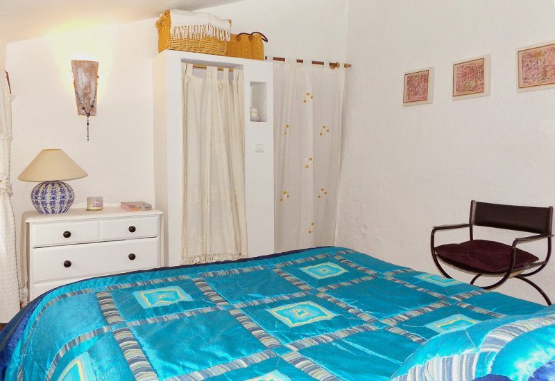 A guest bedroom in a white village of Andalusia