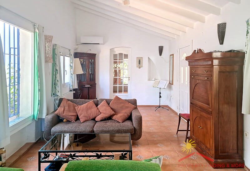 Lounge with seating area by a large window