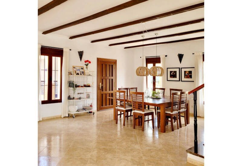 The living room in the main house offers also a big dining area.