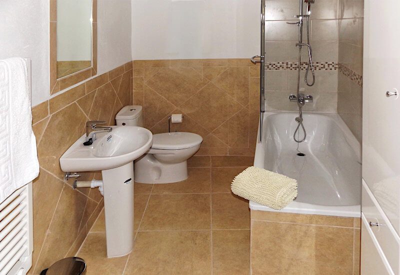 The bathroom has not only a window also heating