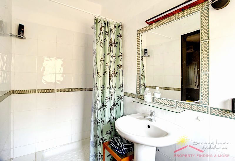 Badkamer van het extra huisje Casita