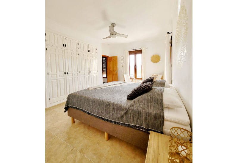 the corner room is spacious and has a lot of wardrobes