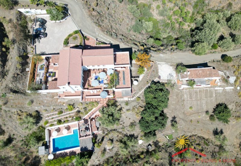 Top view of Casa La Zapatera with main house and pool