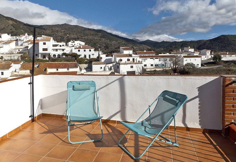 Roof terrace with a gorgeous view over Sedella and the mountain ridge surounding it.