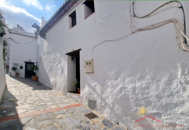 Street with house entrance of Casa Afifa