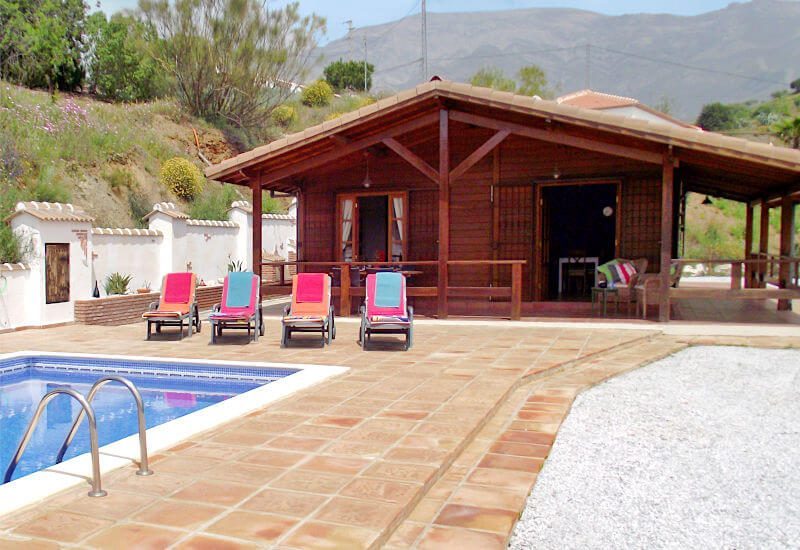 Foto Casa de Madera met zwembad en zonneterras