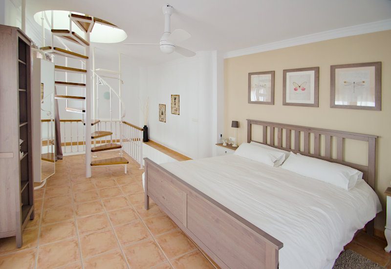 the master bedroom offers enough space for a large double bed and wall cupboards