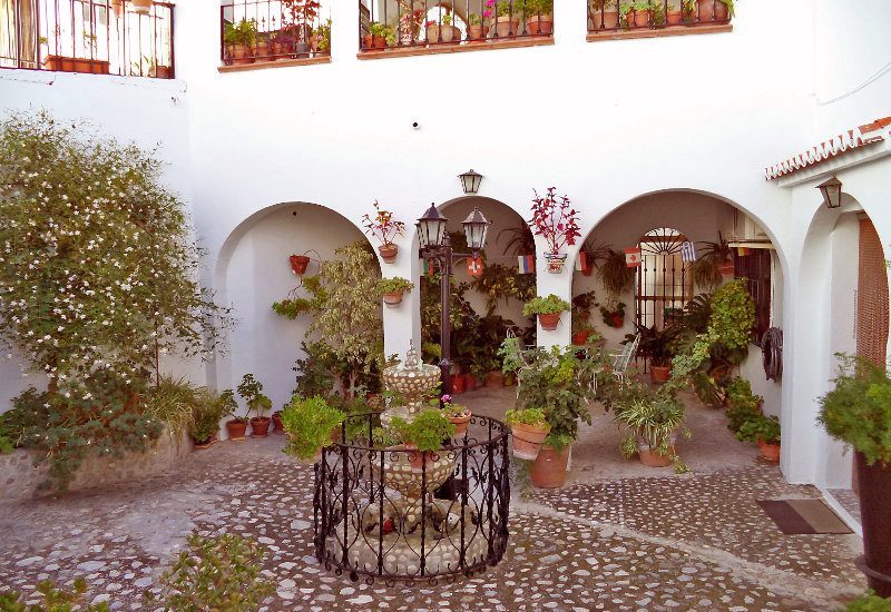 Typical Andalusian courtyard with trees in La Axarquía