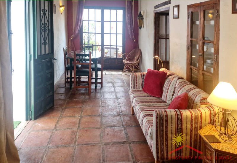 Living room and dining room at the entrance to the village house
