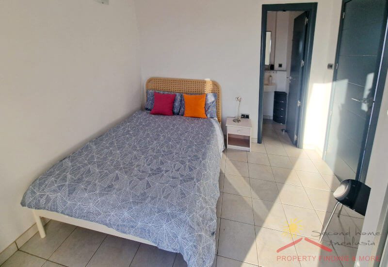 Bedroom 1 with a single bed and a en-suite bathroom