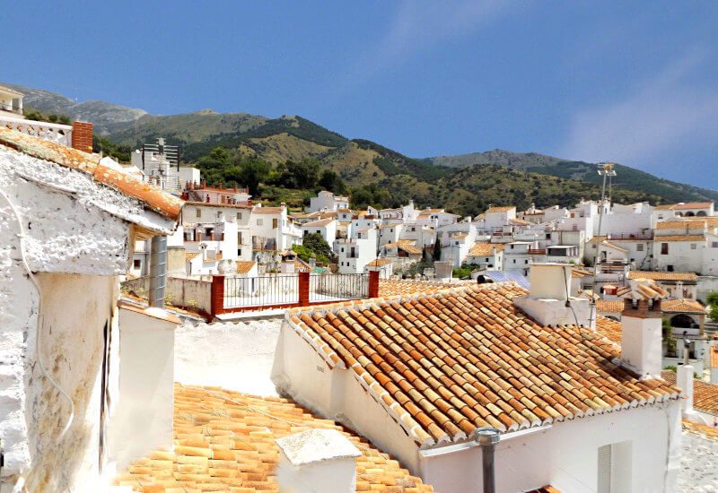View over the old village of Sedella with typical andalusian roofs.