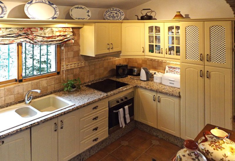 The Kitchen is fully equipped and  with a window.