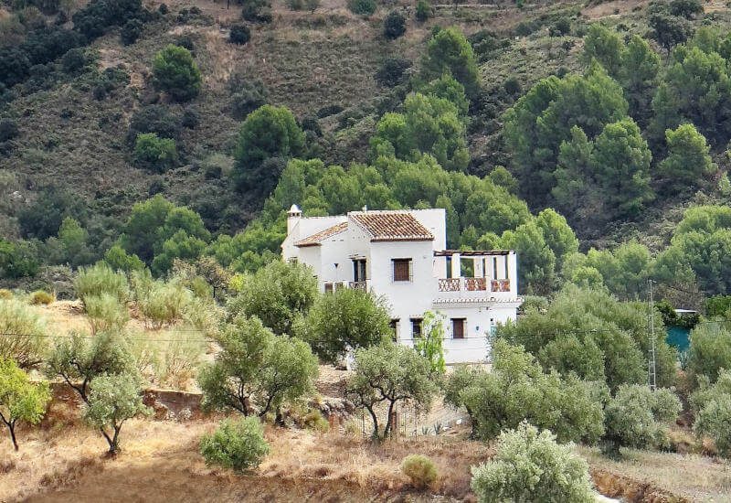 a distant view of Finca Ladera in the Axarquia for sale