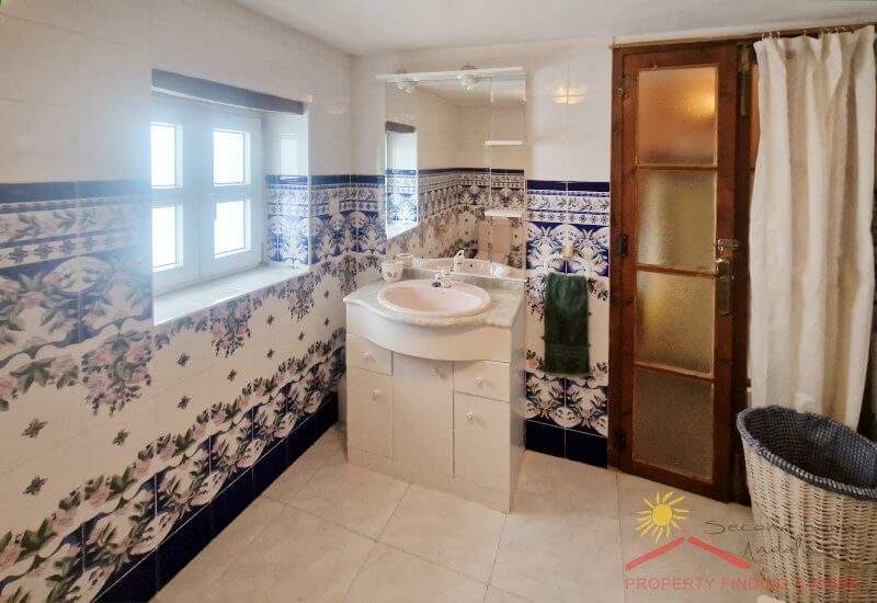 The bathroom has a new insulating window