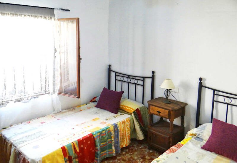 Bedroom B with double beds and big window