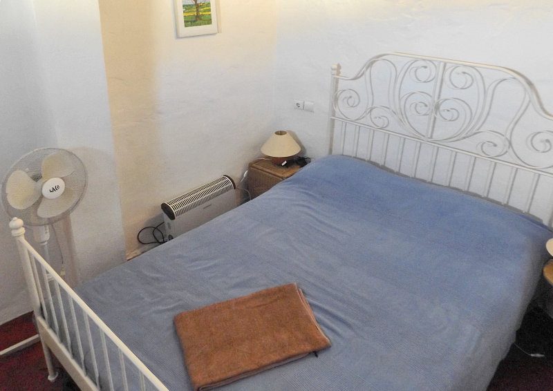 Bedroom 2 with double bed  and heating.