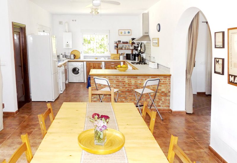 View from the Diner into the open kitchen with access to the lounge ad the bedrooms.