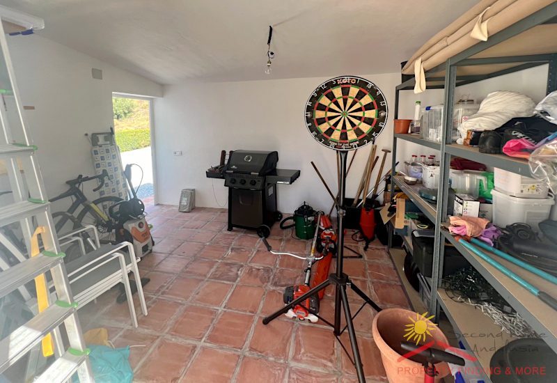The store room is big with metal shelves