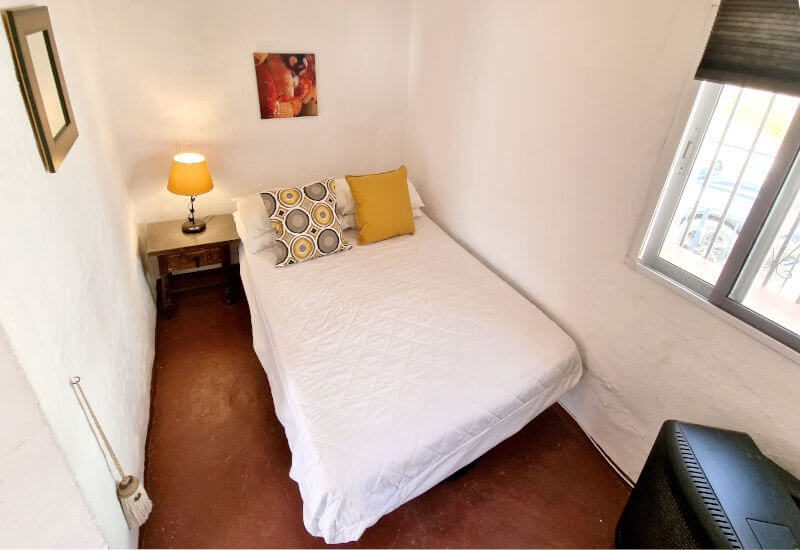 The 2nd guest bedroom is a small room with a single bed