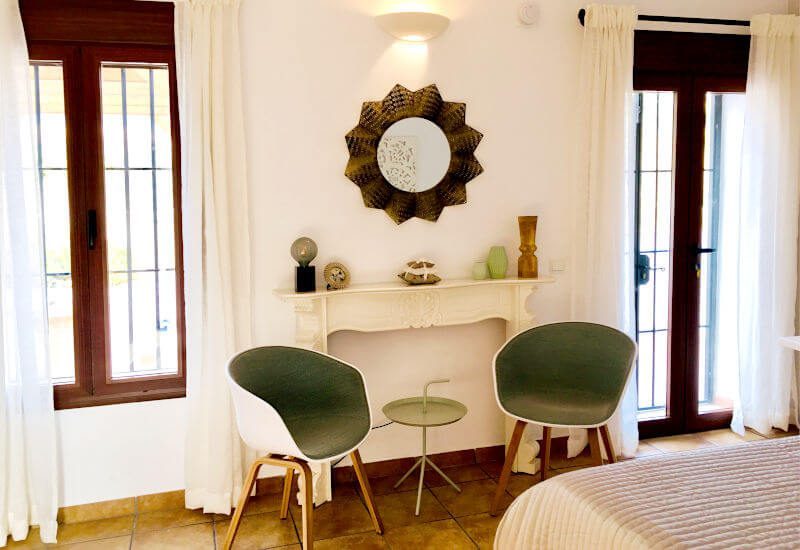 Terrace room with a stylish sitting place and huge windows