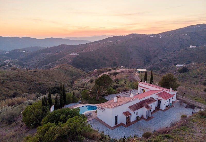 View from above over Finca La Cencerra for sale and the hills around Sedella.