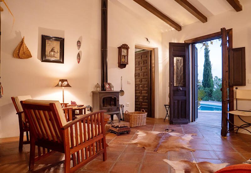 The salon has a large double glass patio door.