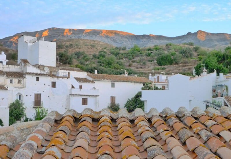 The terrace view of the Maroma mountain and the roofs of Sedella