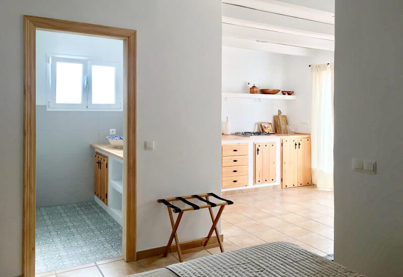 Foto from bedroom with view on bathroom and kitchen