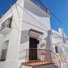 Casa Narciso Voorkant en ingang van Casa Narciso in Sedella te koop