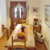 Diner Diner with big wooden table in casa calle Viriato.