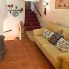 Reception Photo of the reception with sofa and log burner with nice lightning and staircases up and down