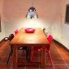 Eetkamer met grote tafel in een Spaans herenhuis