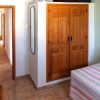the 4th bedroom / study has a built-in wardrobe and a single bed