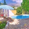 Pool & Terrasse Pool und Terrasse auf der Rückseite von Casa Coppe
