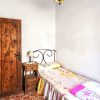 Schlafzimmer C Schlafzimmer C mit einem Einzelbett mit Eisengestell