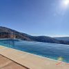 Infinity pool From the modern infinity pool you have a phantastic view over the hills to the sea of the Axarquía