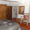 Master bedroom Master bedroom with 4 door wardrobe, old fashioned small wooden door towards staircase