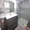 Modern bathroom with large shower and glass wall
