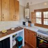 Keuken Keuken in houten stijl met veel opbergruimte