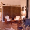 Salon Salon with large wall cupboard, seating furniture and fireplace