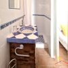 Small but fully equipped en-suite guest bathroom.
